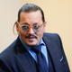 Image for article titled Johnny Depp Settles Assault Case With Male Crew Member He Punched